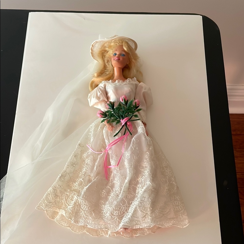 Vintage Barbie with 1986 wedding dress outfit.
